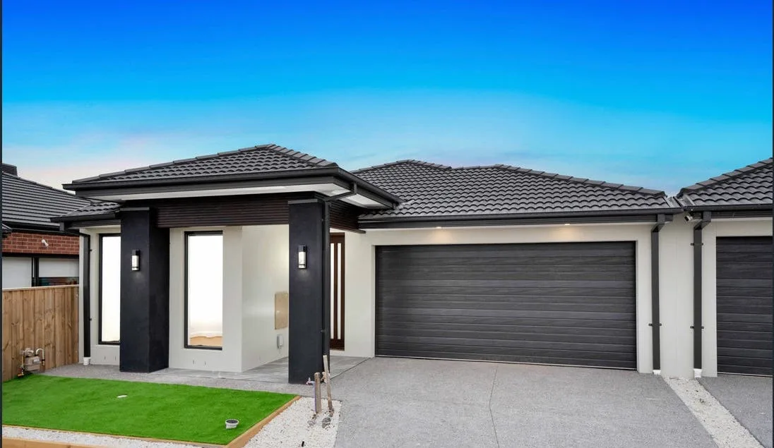 Concrete driveway outside a modern Pakenham home