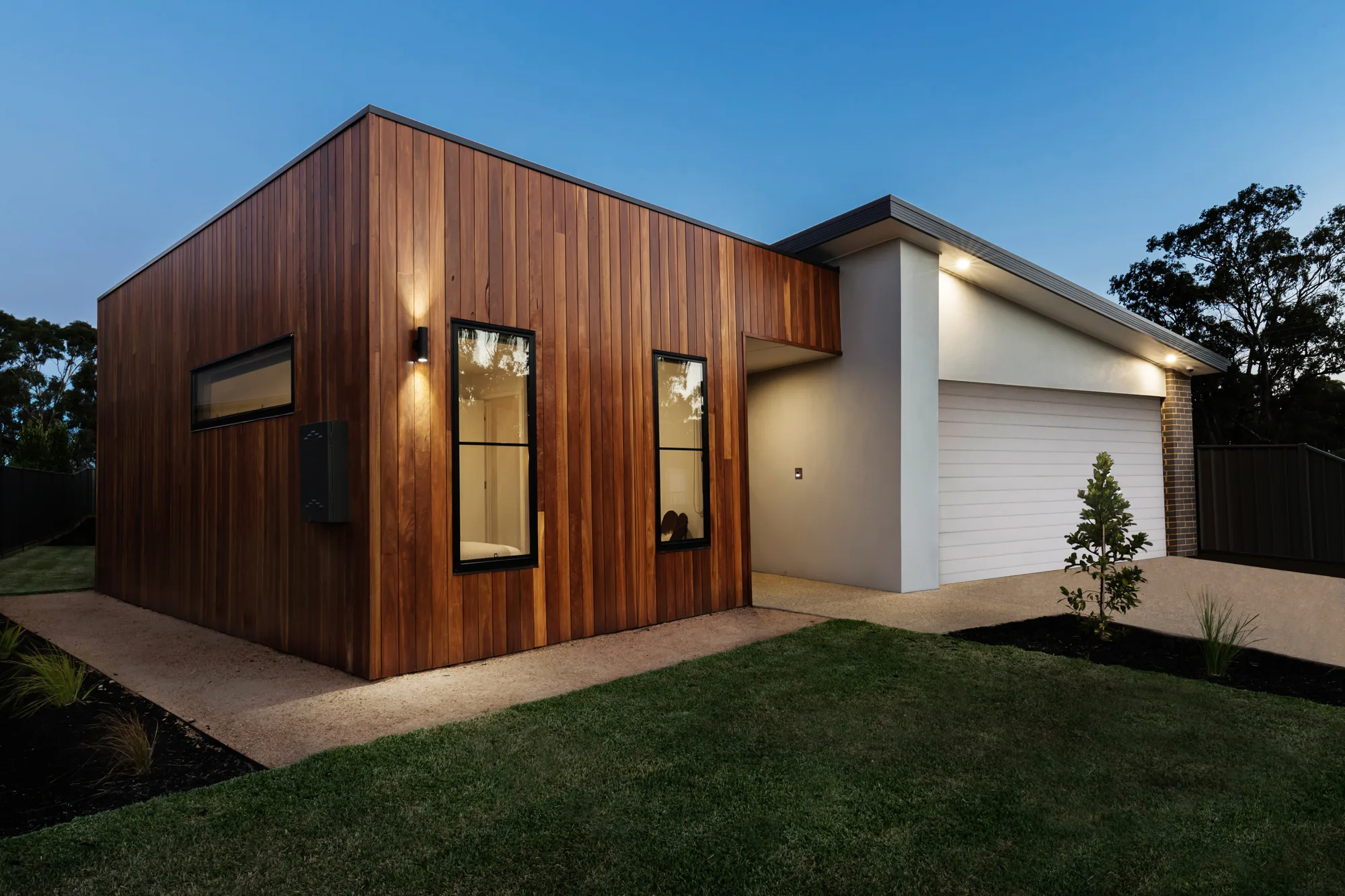 Concrete footpaths connecting driveways across neighbouring properties