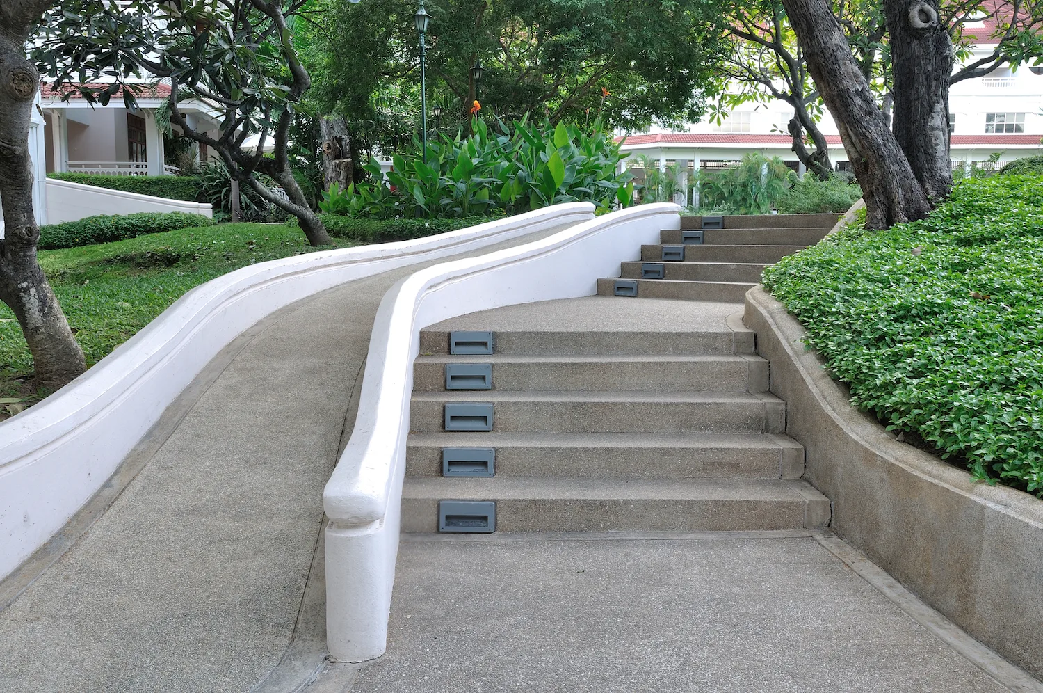 Concrete access ramp finished with a broom texture